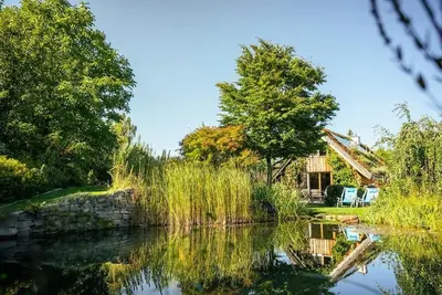 Image de Romantisches Holzhaus mit Schwimmteich, Direkt an Kinderskipiste