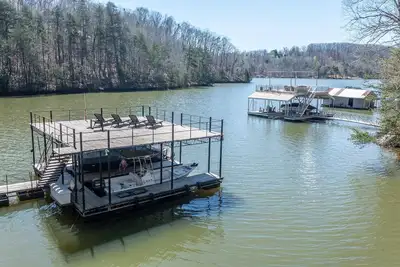 Lakefront | Private Dock | Roomy Home at Lake Lanier | 2 Kitchens | Secluded Location