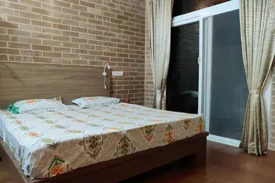 Image de Kabini Earthern Cottages Lakeside Farmstay\n