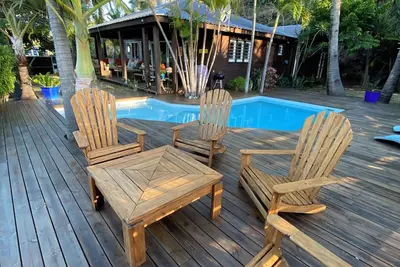 Image de Charmante maison bois jardin exotique aux Colimaçons à environ 10min de Kélonia!