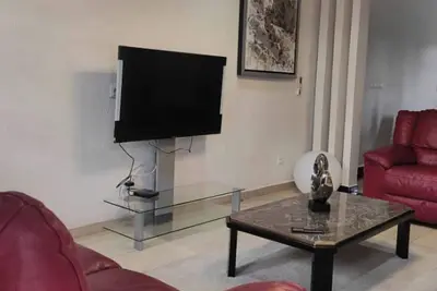 Image de appartement moderne dans un espace verdoyant et calme