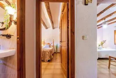 Image de Chalet 'Ca La Rosalia' avec vue sur la montagne, piscine partagée, jardin et Wi-Fi