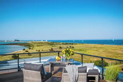 Image de Villa Meeresrauschen - 1. Reihe am Wasser, Sauna, Whirlwanne, Kamin, Terrasse