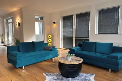 Image de KingSize Bed, two SofaBed, Full Kitchen, WorkSpace 650MBit, Netflix, Centrum,