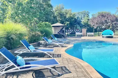 Image de Gorgeous house with pool, beautiful backyard, garden and koi fish pond