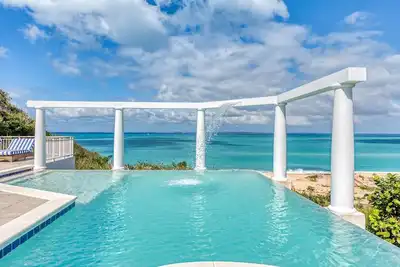 Image de Nid D'Amour - 2 Bedrooms - 2 minutes from Baie Rouge Beach