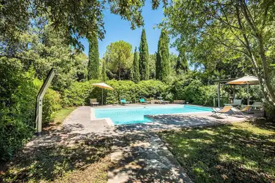 Image de Ferme \"Melograno Podere Giardino\" avec piscine partagée, terrasse privée et Wi-Fi