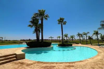 Image de Appartement musc garden avec piscine au centre  ville