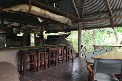 Image de Authentic yet pristine, The Watering Hole is a quiet B&B just outside of Moshi!