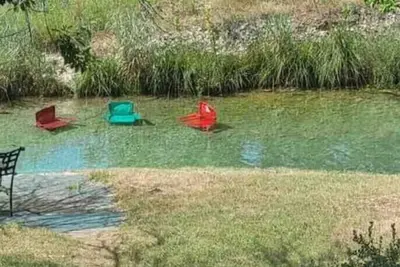 Image de A Peaceful Riverfront home w/ great swimming hole\n