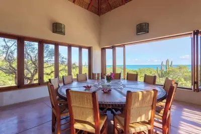 Image de Gorgeous beach front home with pool and pickleball court.