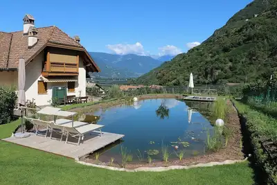 Image de Appartement de vacances \"Rosengartnerhof Maultasch\" avec vue sur les montagnes, piscine et Wi-Fi