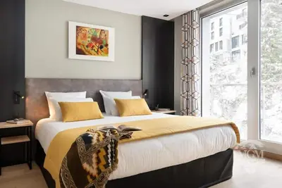 Image de Wifi, pied des pistes de ski, vue pistes de ski, piscine, sauna, hammam, balcon, parking, télévision