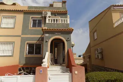 Image de Two bedroom Town house with basement, aircon, communal pool, wifi and sea views