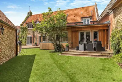 Image de 4 chambres à coucher à Mundesley