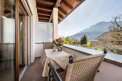 Image de Appartement de vacances \"Rosengarten B\" avec vue sur les montagnes, terrasse privée et Wi-Fi