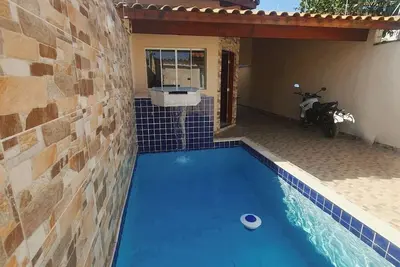 Image de Cozy house with pool in California Itanhaém.
