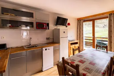 Image de Bel appartement avec vue pistes et cuisine rénovée