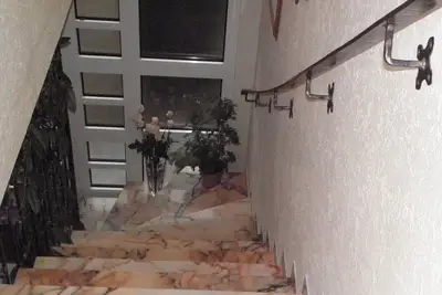 Image de Helle und Ruhige Ferienwohnung in Waldnähe