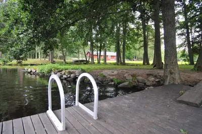 Image de Red and white holiday home beautifully situated by the river Emån