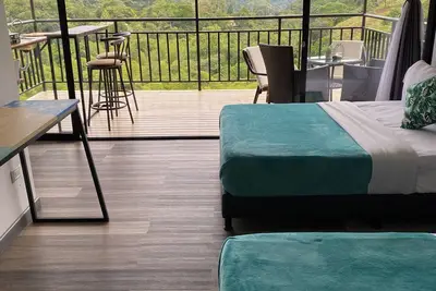 Image de Amari:cabaña Garzas, di Vega Cundinamarca. Balcón, terraza, jacuzzi