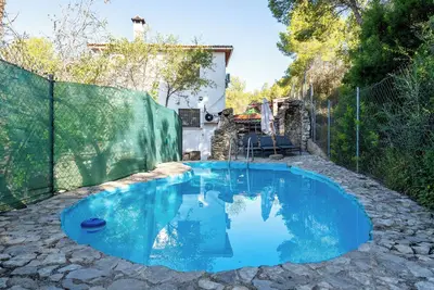 Image de Maison de vacances 'Casa Calafell' avec vue sur la montagne, Wi-Fi et climatisation