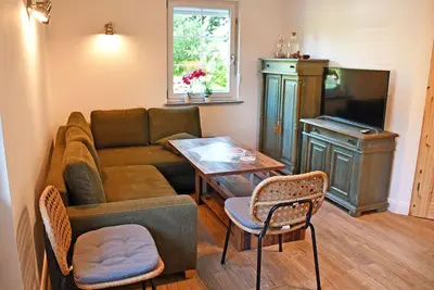 Image de Ferienwohnung Achtern - Ferienwohnungen auf dem Pommernhof mit Großem Garten!