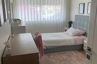 Image de Room with private bathroom in large family apartment