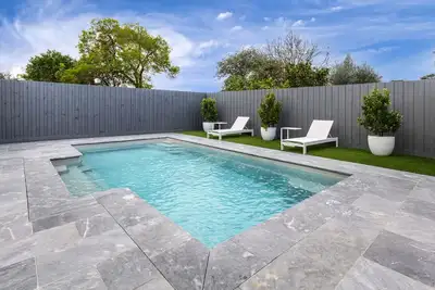 Image de Newly Renovated 4 Bedroom Home With Pool. 600m to Front Beach & Shops