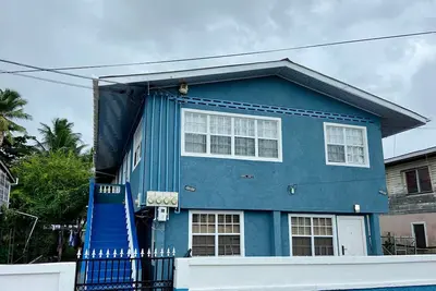 Image de Right between Guyana’s famous malls, family sized condo with safe neighborhood