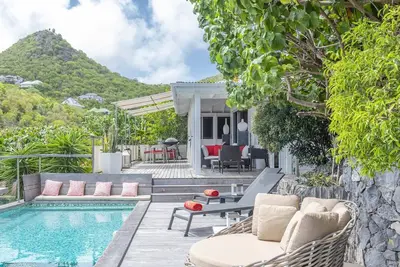 Image de Villa Aloa- Dine alfresco on your poolside deck while looking out at the sea.