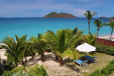 Celina- Modern and open beachfront living, within steps of the beach and shops