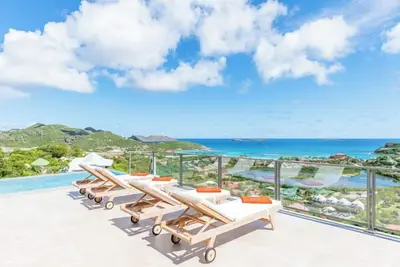 Image de L’Oiseau Bleu- New build, in the hills of St Jean, panoramic bay and ocean views