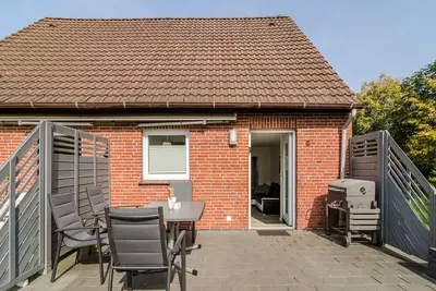 Image de Appartement de vacances 'Nordsee' avec terrasse partagée, jardin partagé et Wi-Fi