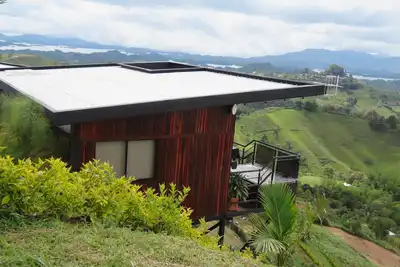 Image de Hermosa Cabaña en Guatapé con Jacuzzi y Cocina. Hermoso Paisaje
