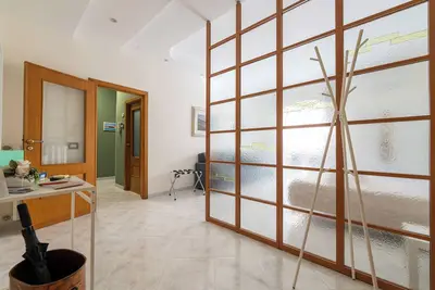 Image de 12 minutes from the historic center. 4 Bed 2 Room Apartment Maradona Stadium