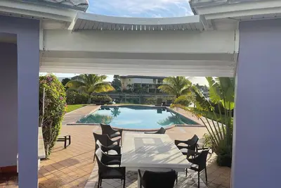 European designed townhouse with boat dock access and 5 mins walk from beach.