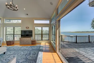 Lakeside Leisure - Peaceful waterfront home with a boat dock and game room.