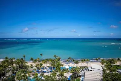 Image de Panoramic Beach Resort in Isla Verde | 4 Suite w/ Living Space & Balcony