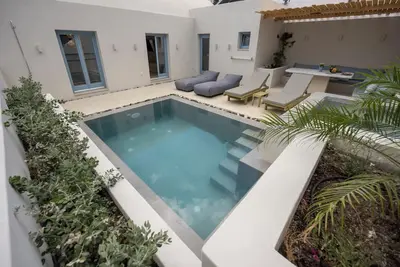 Image de Tholaki Luxury home in Kamari with pool and jacuzzi - 5 min from the beach!