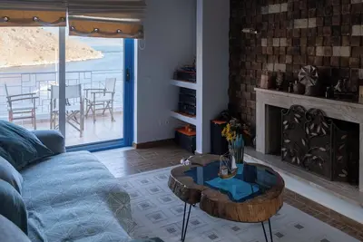 Image de A villa with breathtaking view of the sea and the hills above from the pool deck