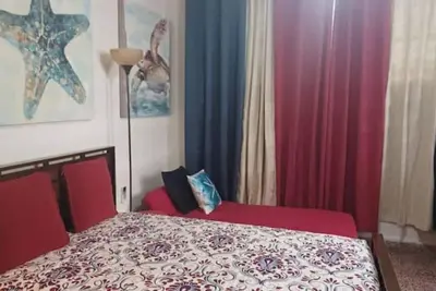 Image de Stay as a tourist & feel as a local; Beach & Loiza st. strip, everything near!