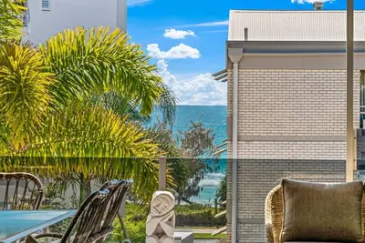 Alex Beach House 100 steps from the beach with ocean views sleeps  11