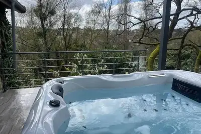 Image de L’Écrin de Verdure - Pavillon avec Spa privatif