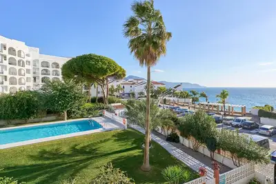Image de Appartement \"Carabeo 23\" avec vue sur la mer et accès direct à la plage