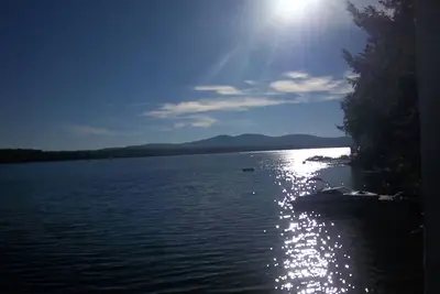 Image de Waterfront Home Boat House Boat Slips Panoramic Lake And Gunstock Mountain View