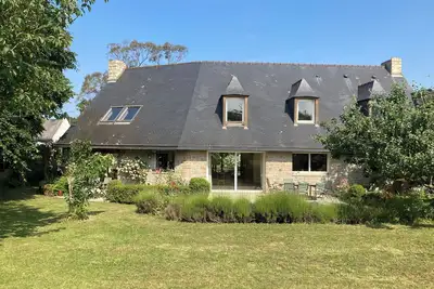 Image de Maison de charme dans un grand jardin à 5 mn du golf du val Andre et de la plage