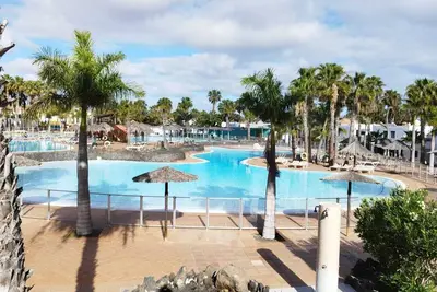 Image de Appartement dans le complexe Oasis Duna avec grand jardin avec piscine