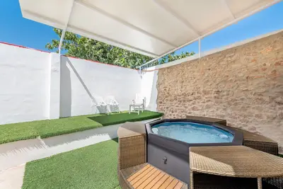 Image de Maison de vacances 'La Bombonera' avec terrasse privée, Wi-Fi et climatisation