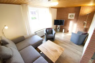 Image de Warfthuus - holiday apartment in Norddeich for up to four people with dog.